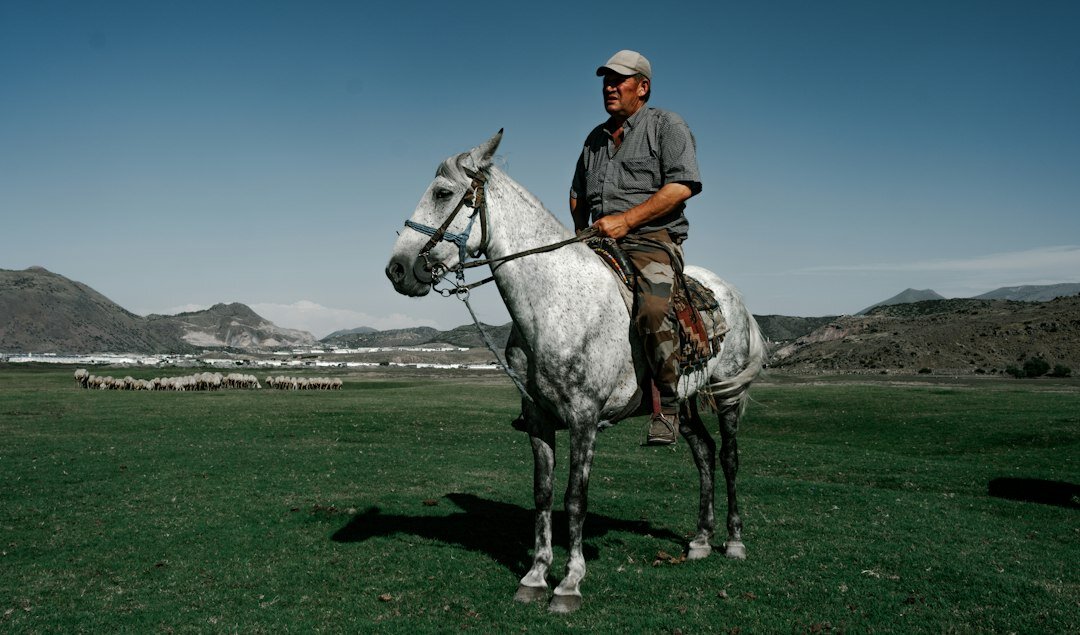 Portrait of a Chilean Patagonian gaucho on horseback