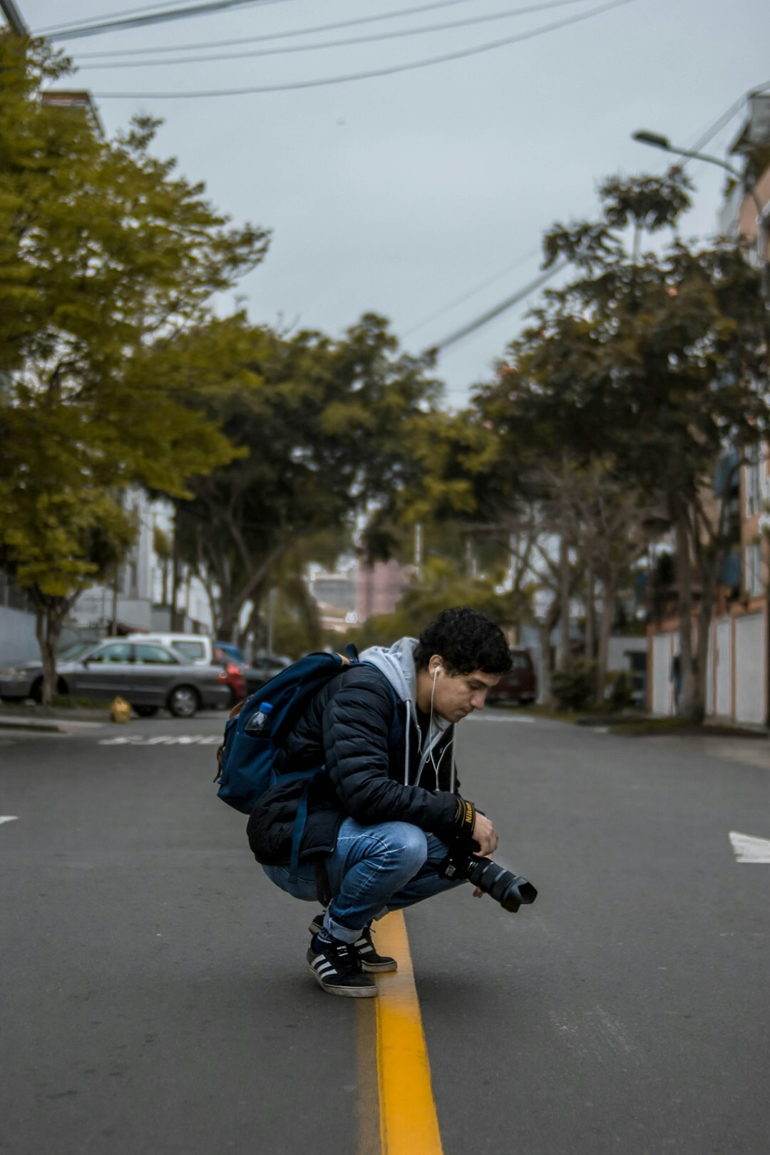 Studio portrait of a middle aged Chilean male documentary photographer